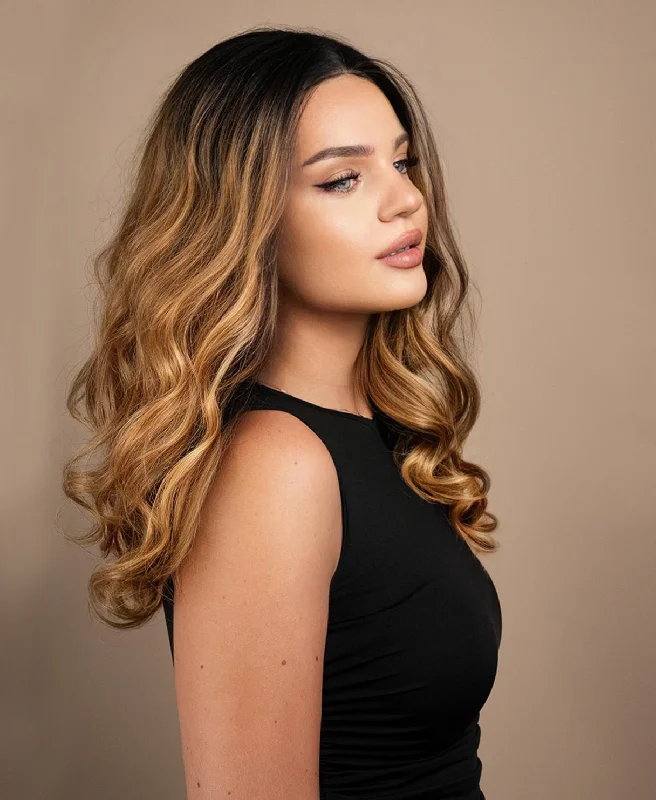 lace front human wig - 18" rooted caramel bouncy curls.